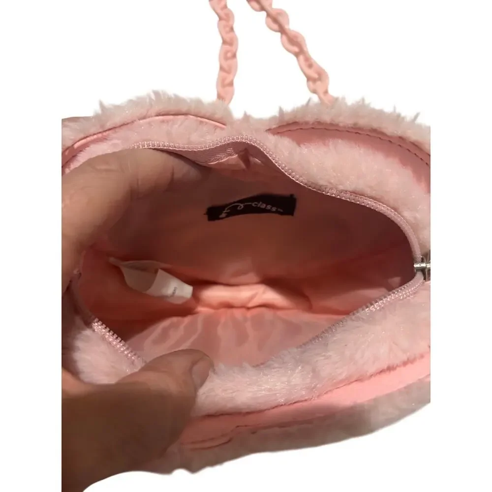 All in motion pink faux fur Herat shaped purse chain link strap worn once euc
